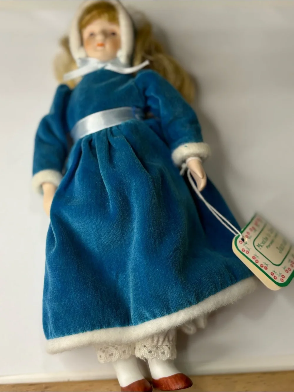 Porcelain Doll in Blue Velvet Dress with White Trim